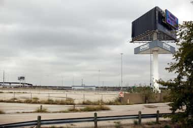 The huge three-sided billboards at the old Texas Stadium site bring in about $600,000...