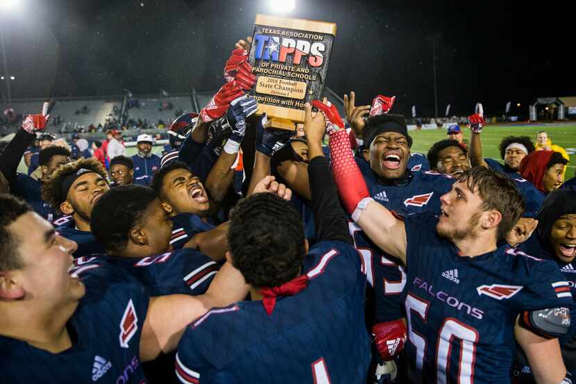 Bishop Dunne celebrates after winning the TAPPS Division I state championship game 13-9...