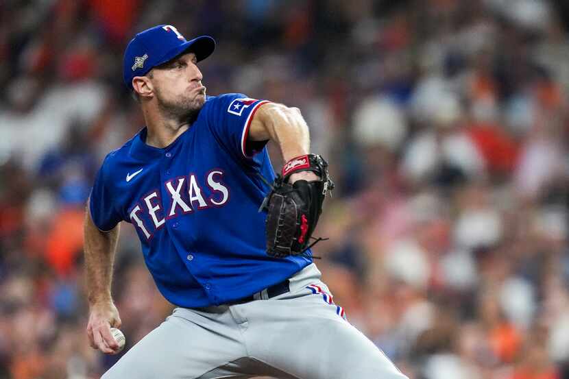 Texas Rangers starting pitcher Max Scherzer (31) pitches against the Houston Astros in the...