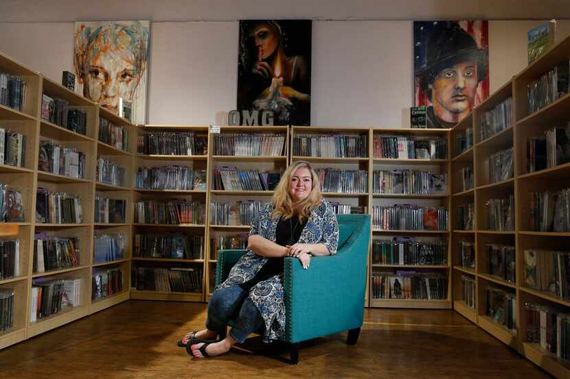 Author Colleen Hoover poses at her bookstore, the Bookworm Box, in Sulphur Springs, Texas.