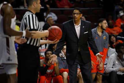 FILE —  Head Coach Lew Hill of the Texas-Rio Grande Valley Vaqueros tries to talk to the...