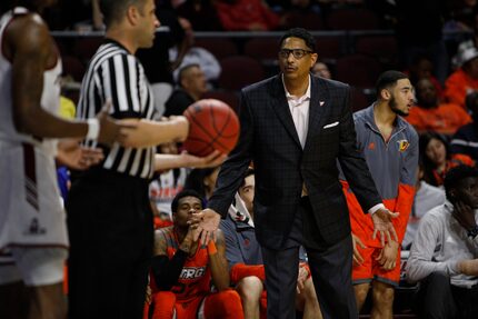 FILE —  Head Coach Lew Hill of the Texas-Rio Grande Valley Vaqueros tries to talk to the...