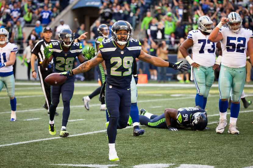 FILE - Seattle Seahawks defensive back Earl Thomas taunts the Dallas Cowboys bench after...