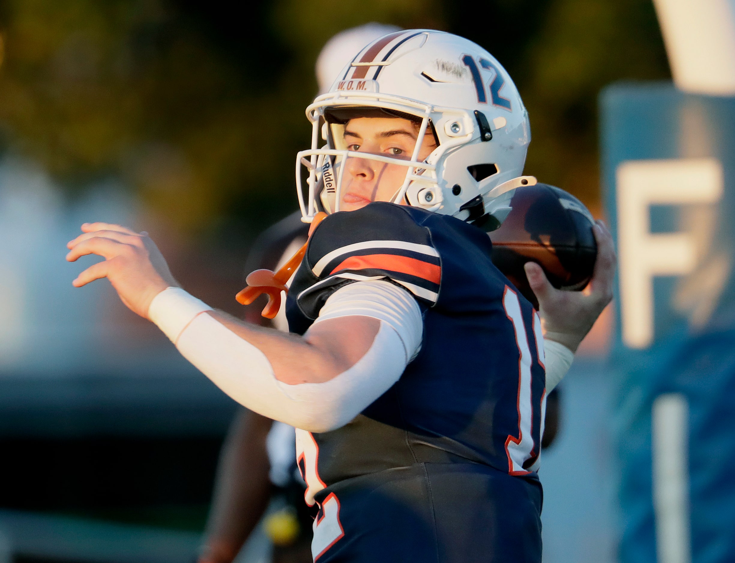 Wakeland High School quarterback Jayden Maples (12) throws a pass during the first half as...