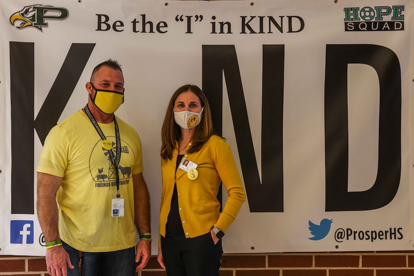 Coach Tony Cooper and Alexis Webb, the PISD point person for Hope Squad, stand with a Hope...