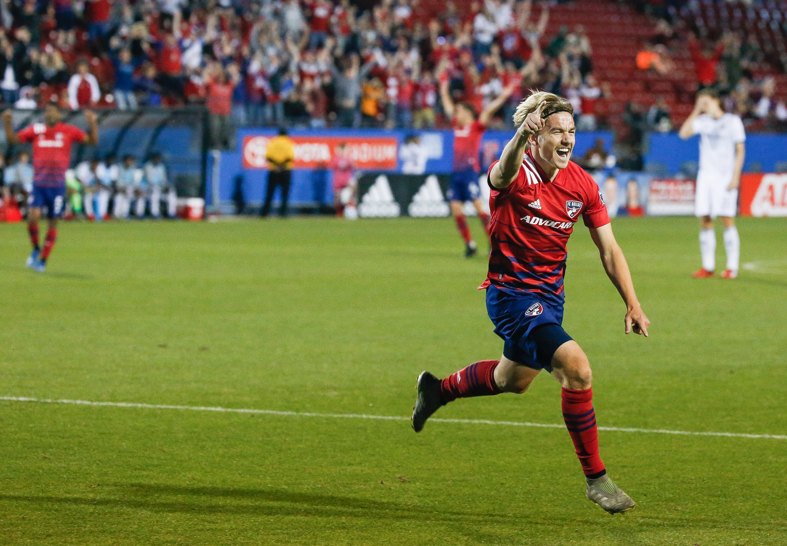 FC Dallas midfielder Paxton Pomykal (19) celebrates a goal during the second half of an MLS...