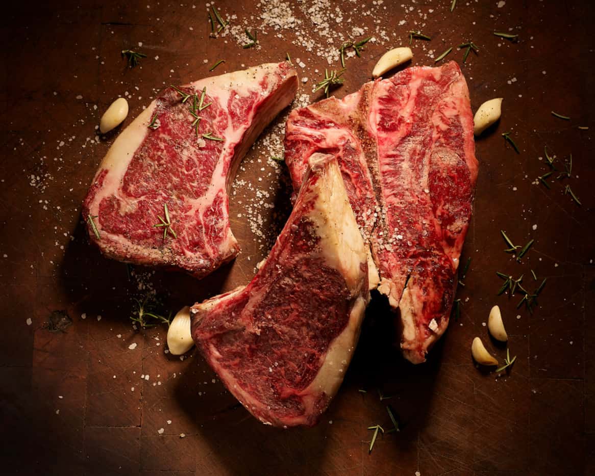 B&B Butchers and Restaurant's dry-aged steaks are USDA grade. Pictured: porterhouse and two...