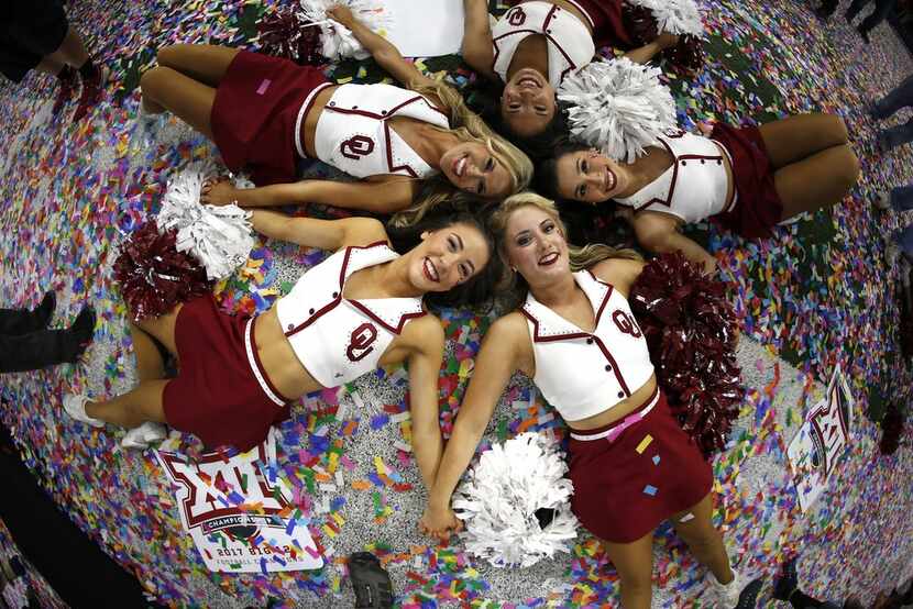 Members of the OU Pom Squad celebrate after the Oklahoma Sooners defeated the TCU Horned...