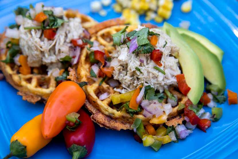 Tex-Mex chaffle is topped with shredded chicken, avocado, mango pico, and cilantro.