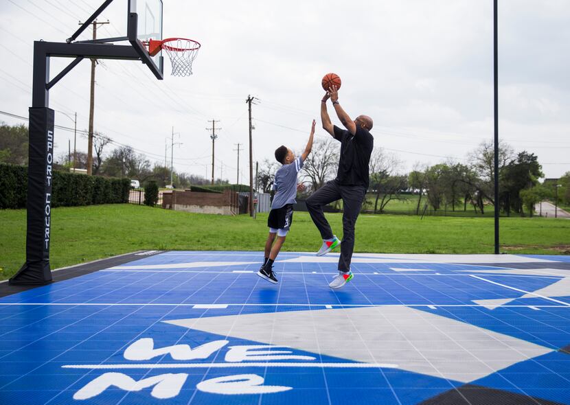 Paul Quinn College president Michael Sorrell played basketball with his 9-year-old son,...