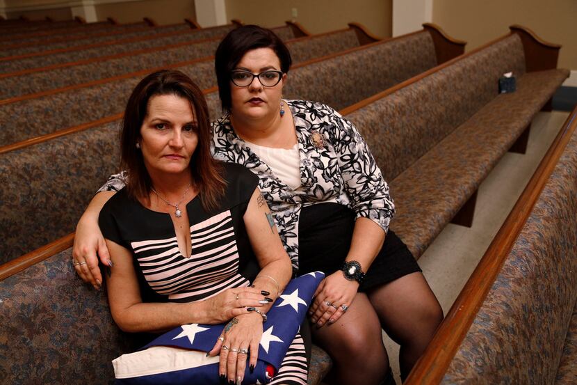 Deanna Staton (left) and Kati Wall pose for a portrait after the funeral of Dennis and Sara...