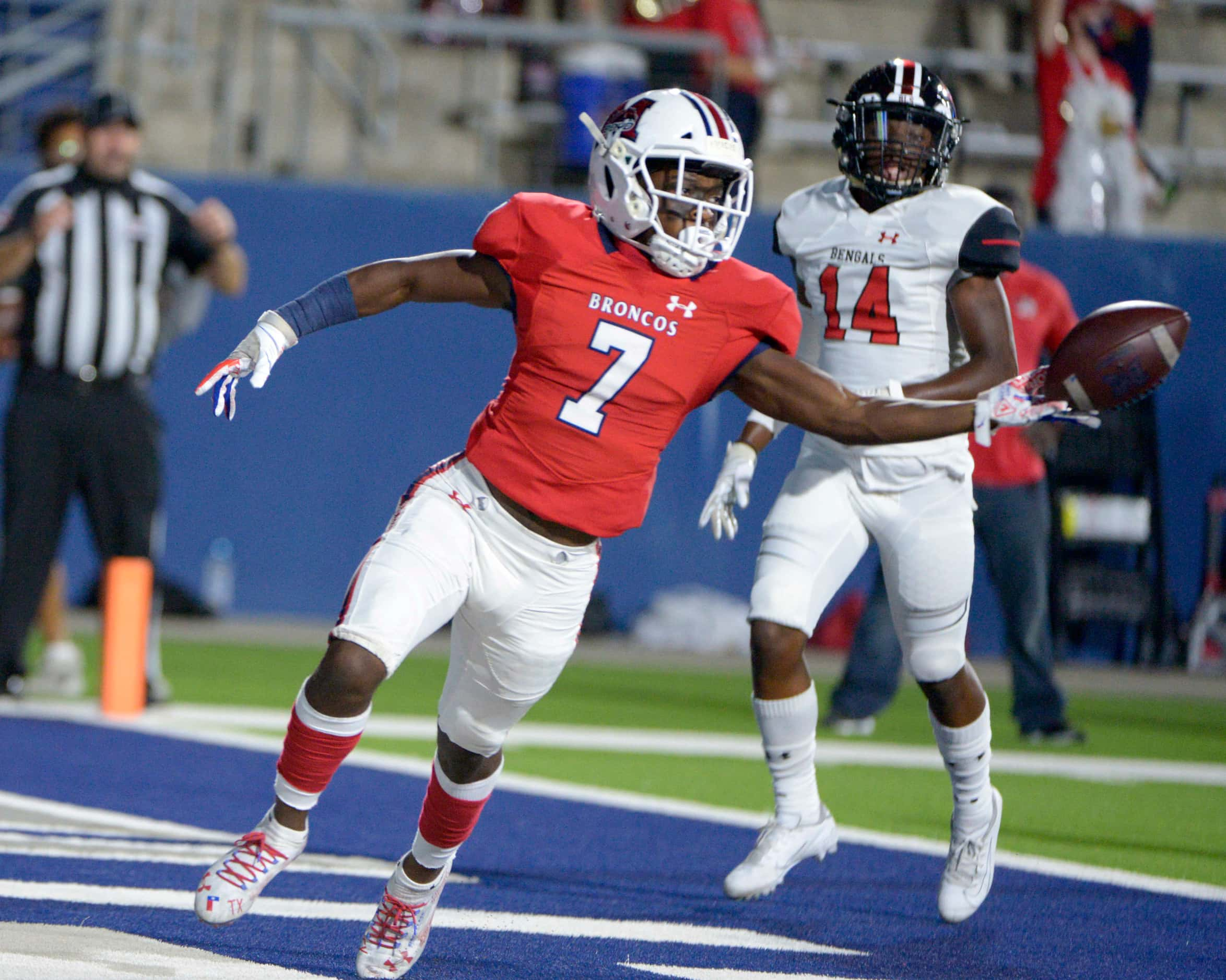 McKinney Boyd’s Peyton Shaw celebrates after a touchdown in the first quarter of a high...