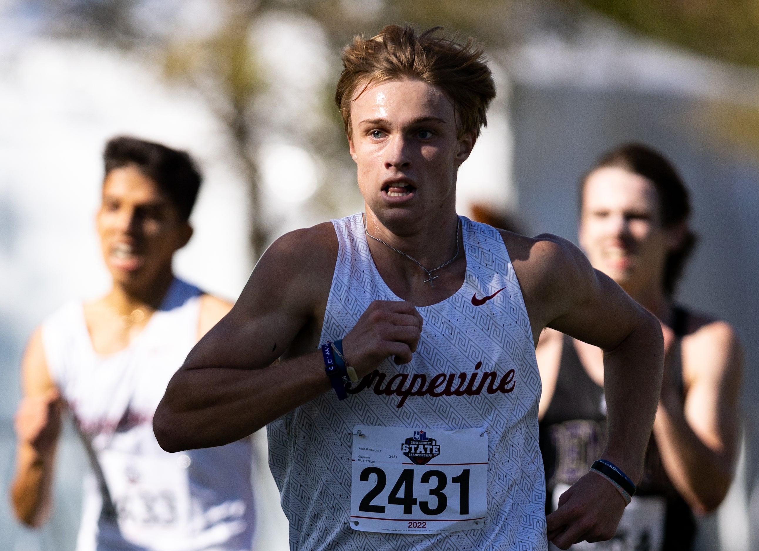 Adam Burlison of the Grapevine Mustangs runs toward the finish in the 5A boys’ 5k race...