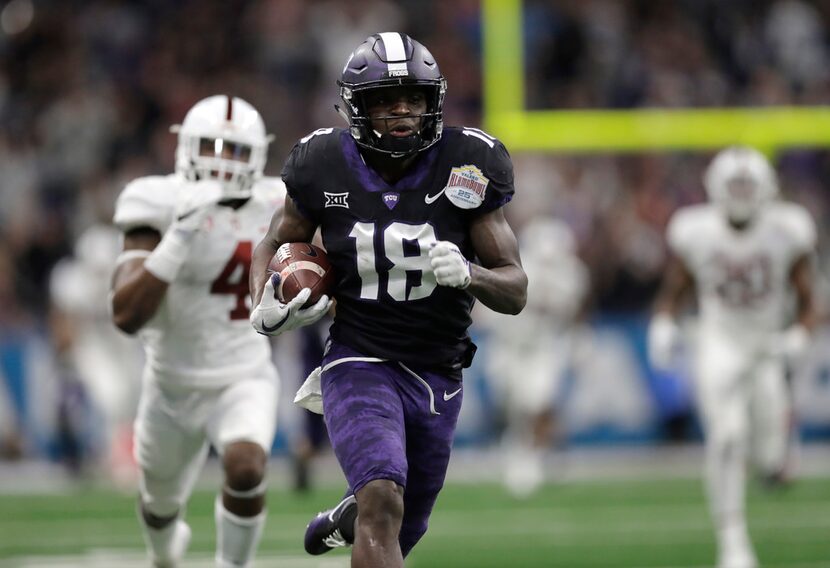 TCU wide receiver Jalen Reagor (18) scores on a 93-yard touchdown reception against Stanford...