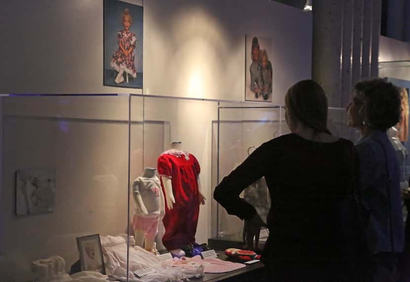 A selection of Taylor Swift's baby clothes are on display at "The Taylor Swift Experience."