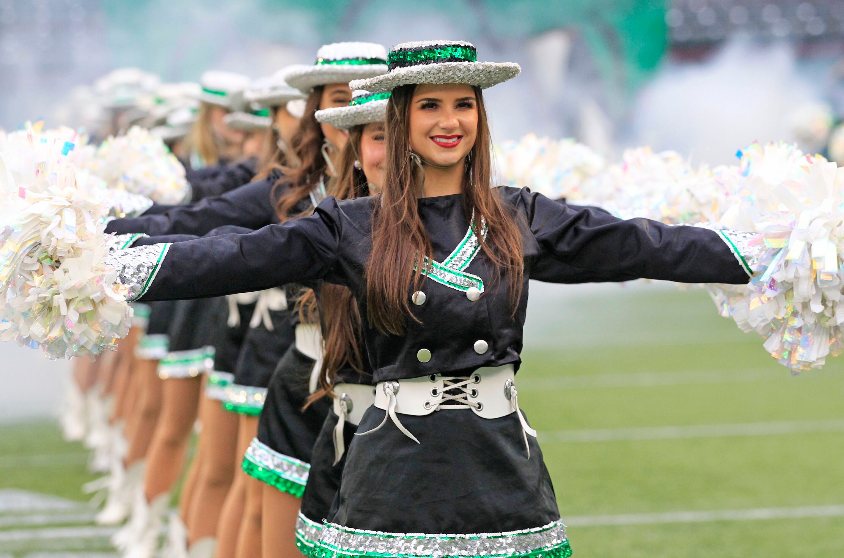 The Southlake drill teams stands at attention during pregame activities before the first...