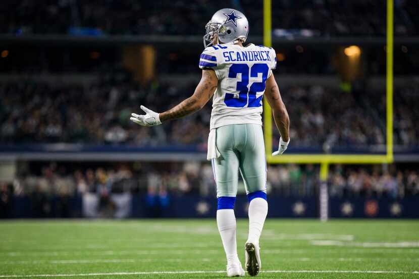 Dallas Cowboys cornerback Orlando Scandrick (32) disputes a call during the fourth quarter...