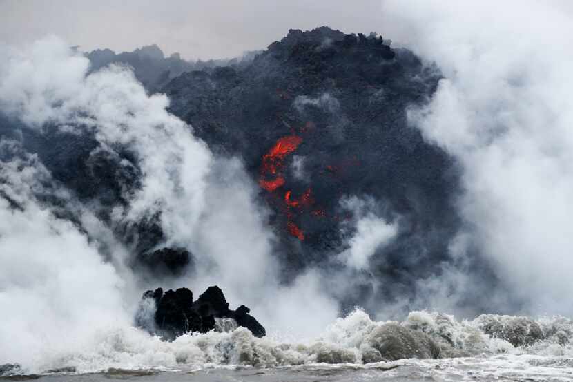 On Sunday, May 20, lava flows into the ocean near Pahoa, Hawaii. 
