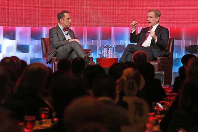 Robert S. Kaplan, President and CEO of the Federal Reserve Bank of Dallas, right, talks with...