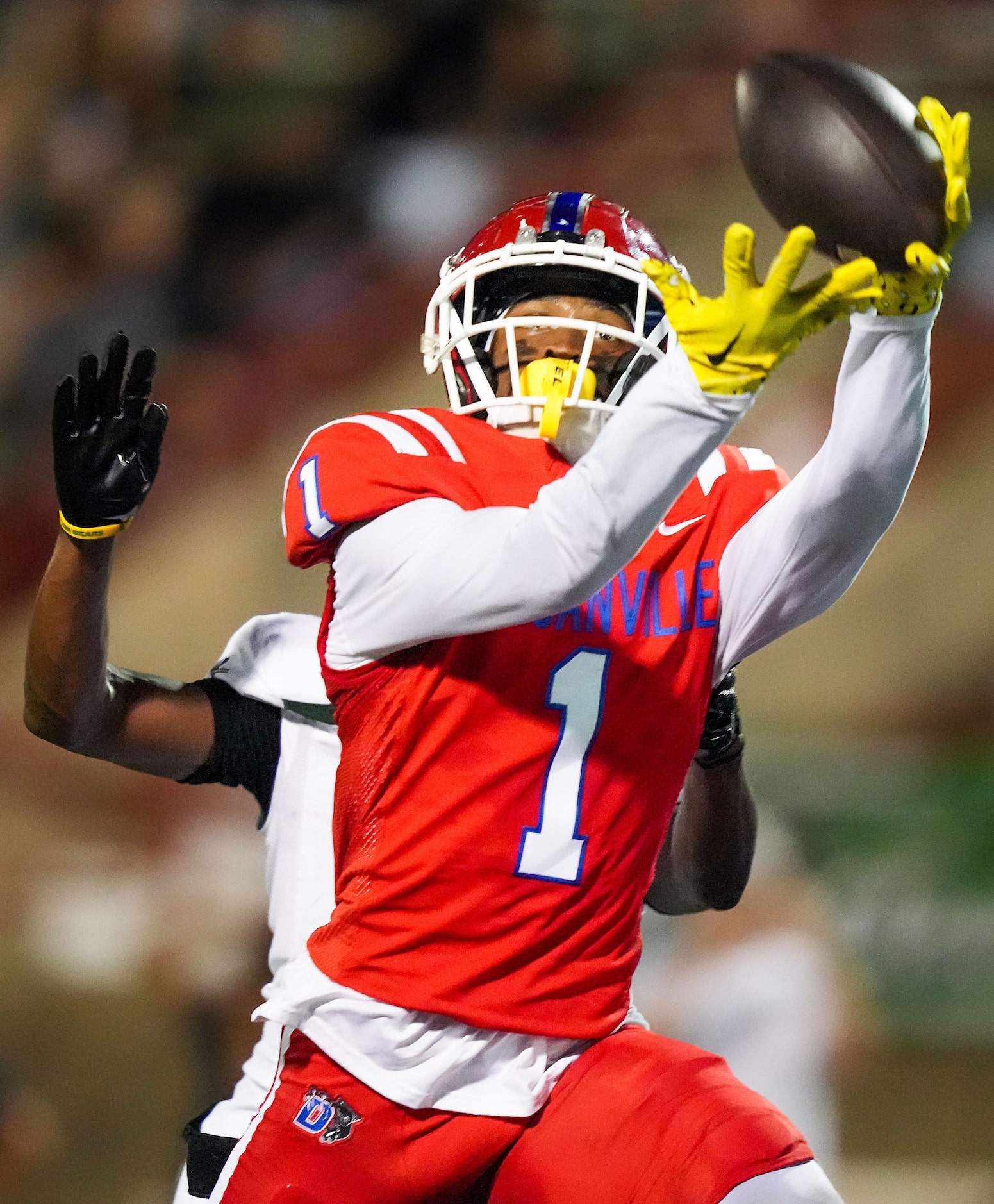 Duncanville wide receiver Dakorien Moore (1) catches a 28 yard touchdown pass as...