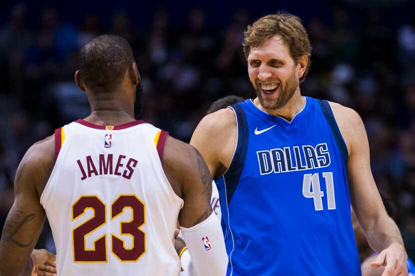 Dallas Mavericks forward Dirk Nowitzki (41) greets Cleveland Cavaliers forward LeBron James...