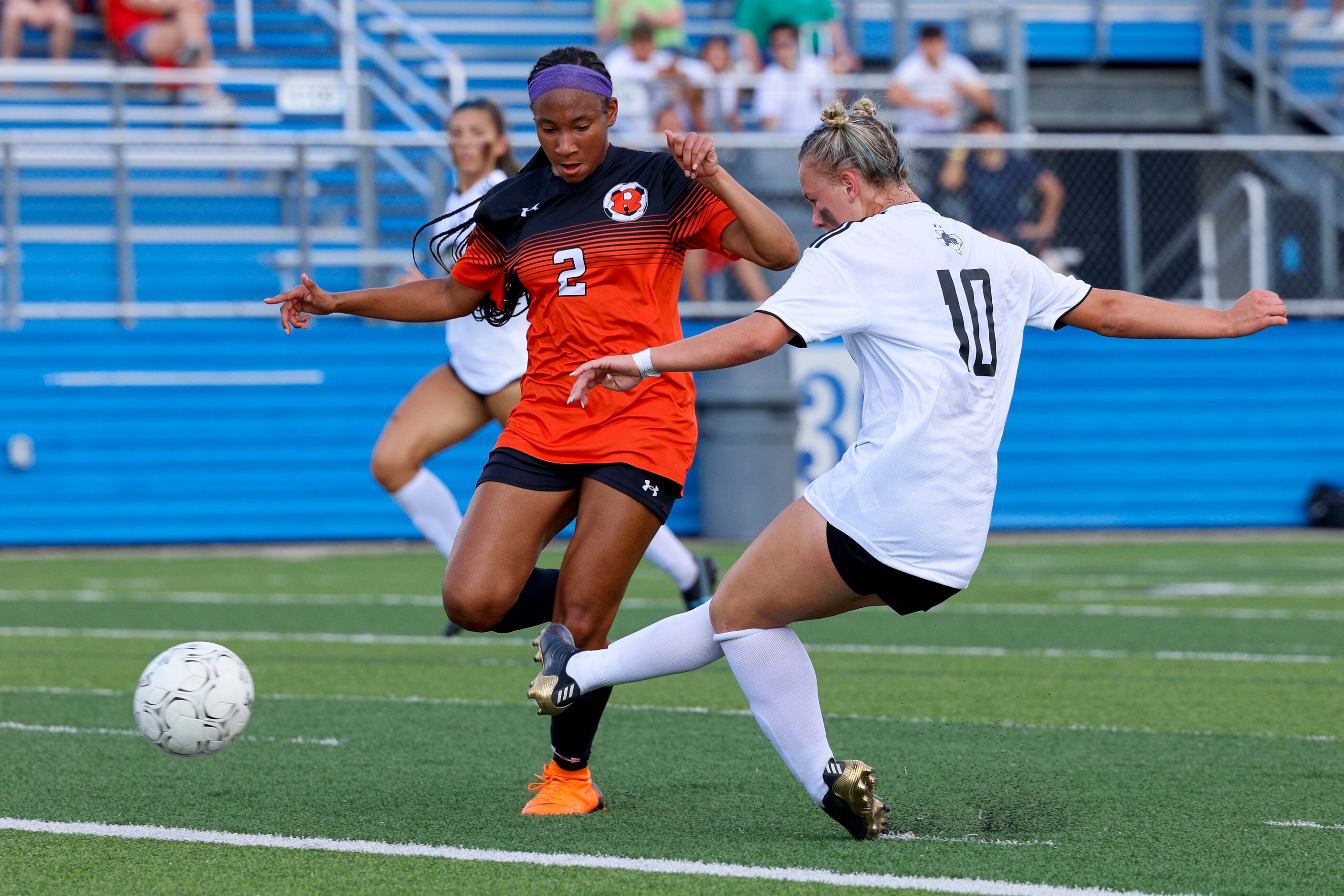 Southlake Carroll midfielder Kennedy Fuller (10) scores a goal in front of Rockwall forward...