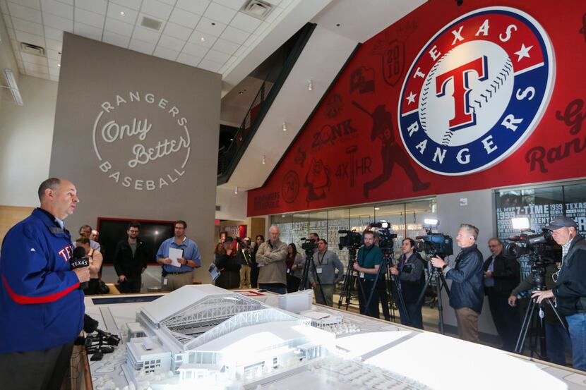 Rob Matwick, Rangers Executive Vice President of Business Operations, unveils a three...