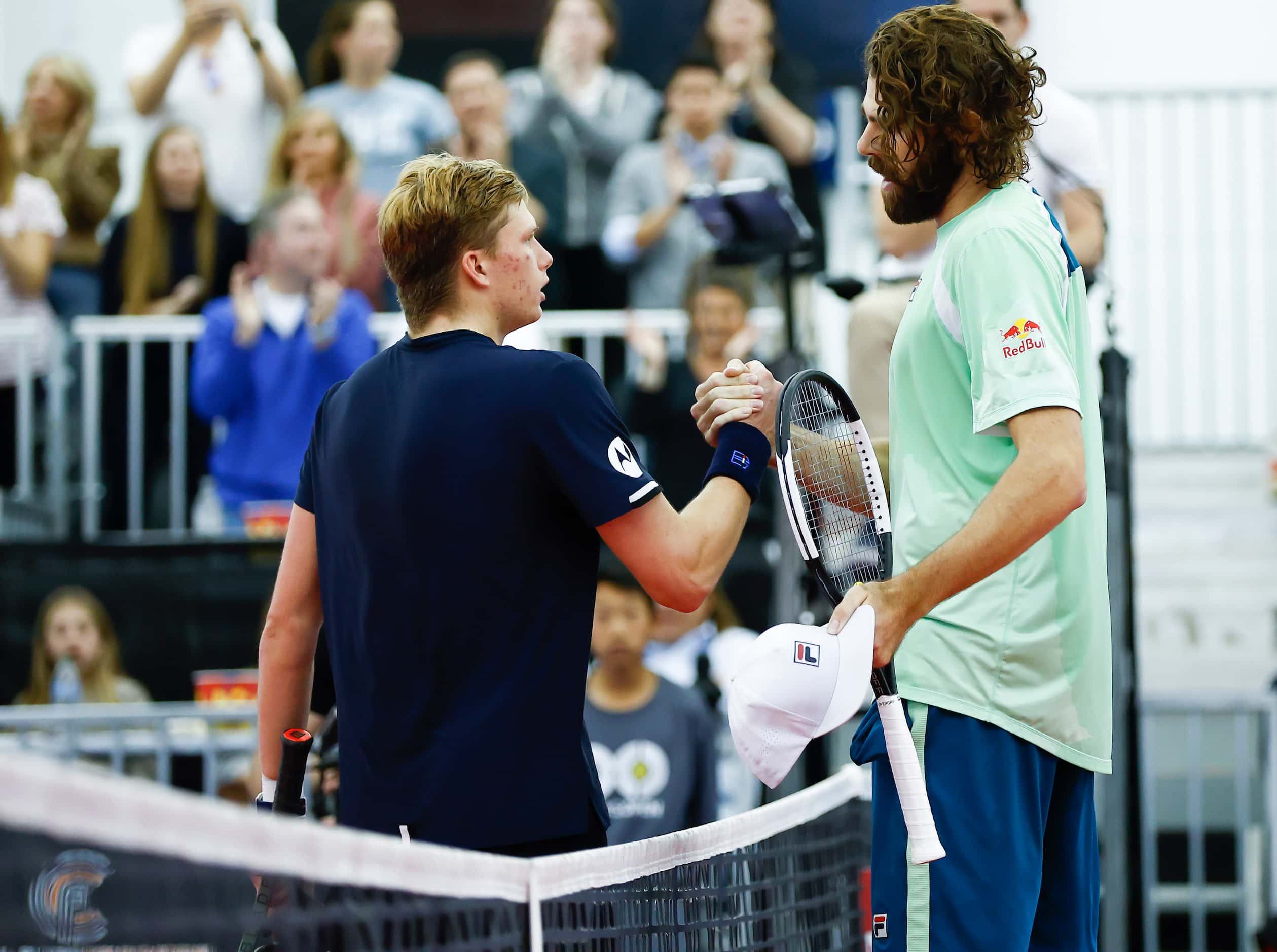 Reilly Opelka, right, and Jenson Brooksby shake hands after the finals ATP Dallas Open at...