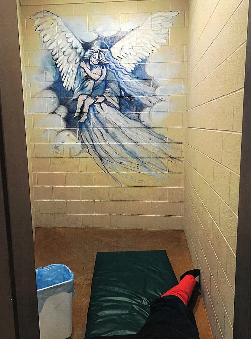 This photograph of a room at the Hill Country Youth Ranch in Ingram, with its mural...