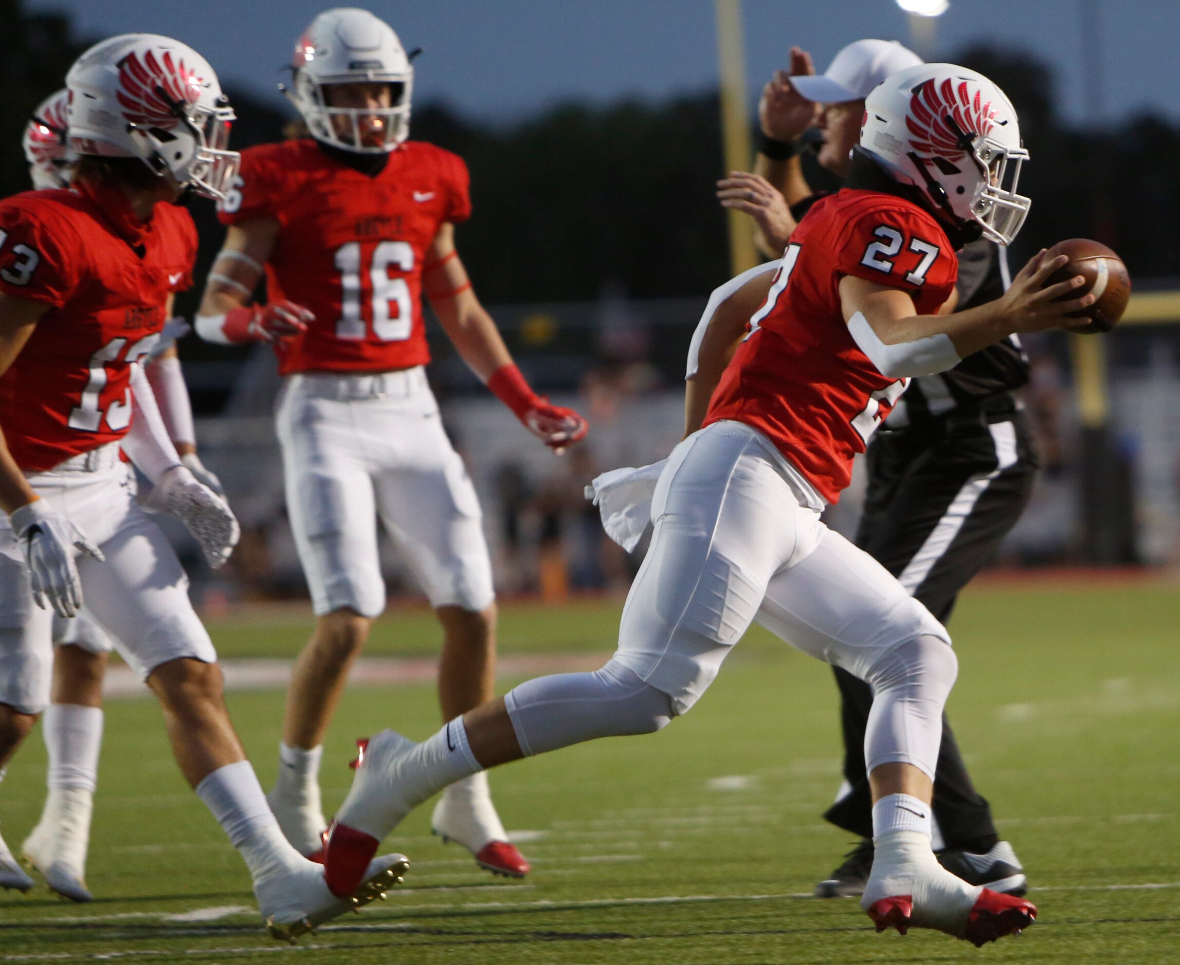 Argyle linebacker Logan May (27) celebrates a first quarter fumble recovery during first...