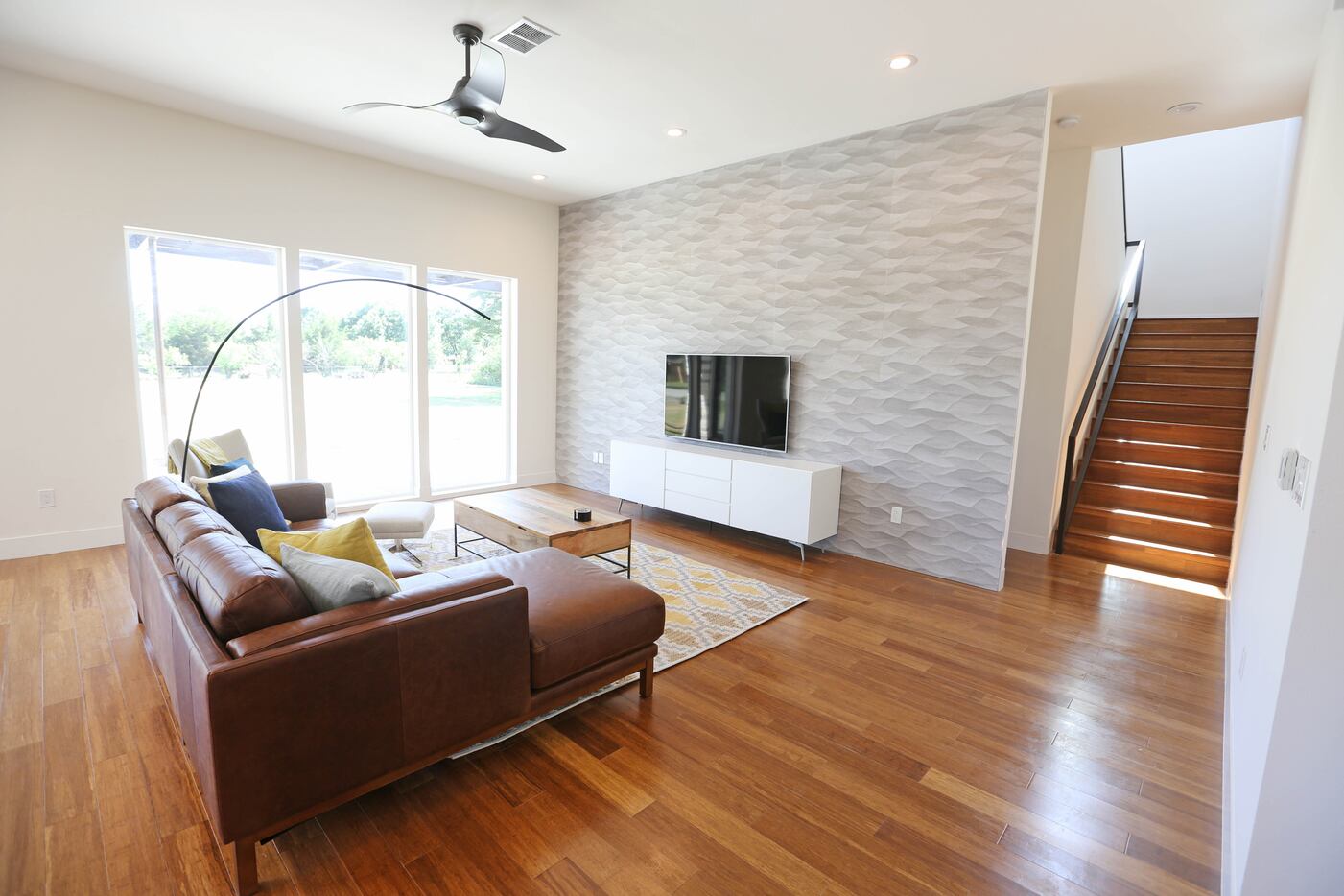 The living room in the New Modern Home, a prototype house that builder Jimmy Tanghongs has...