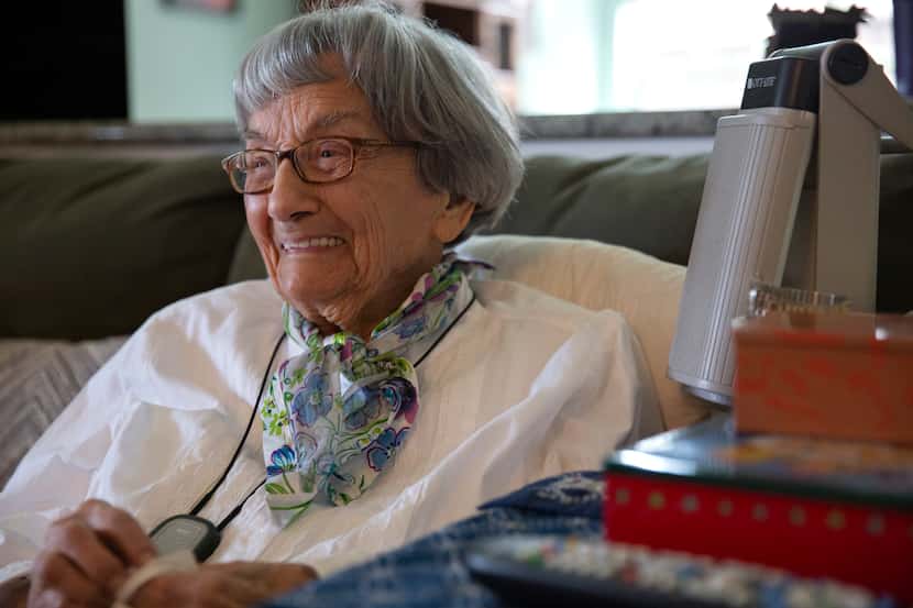 Alice Palmeri laughs while chatting with her family in Sachse, where the 108-year-old lives...