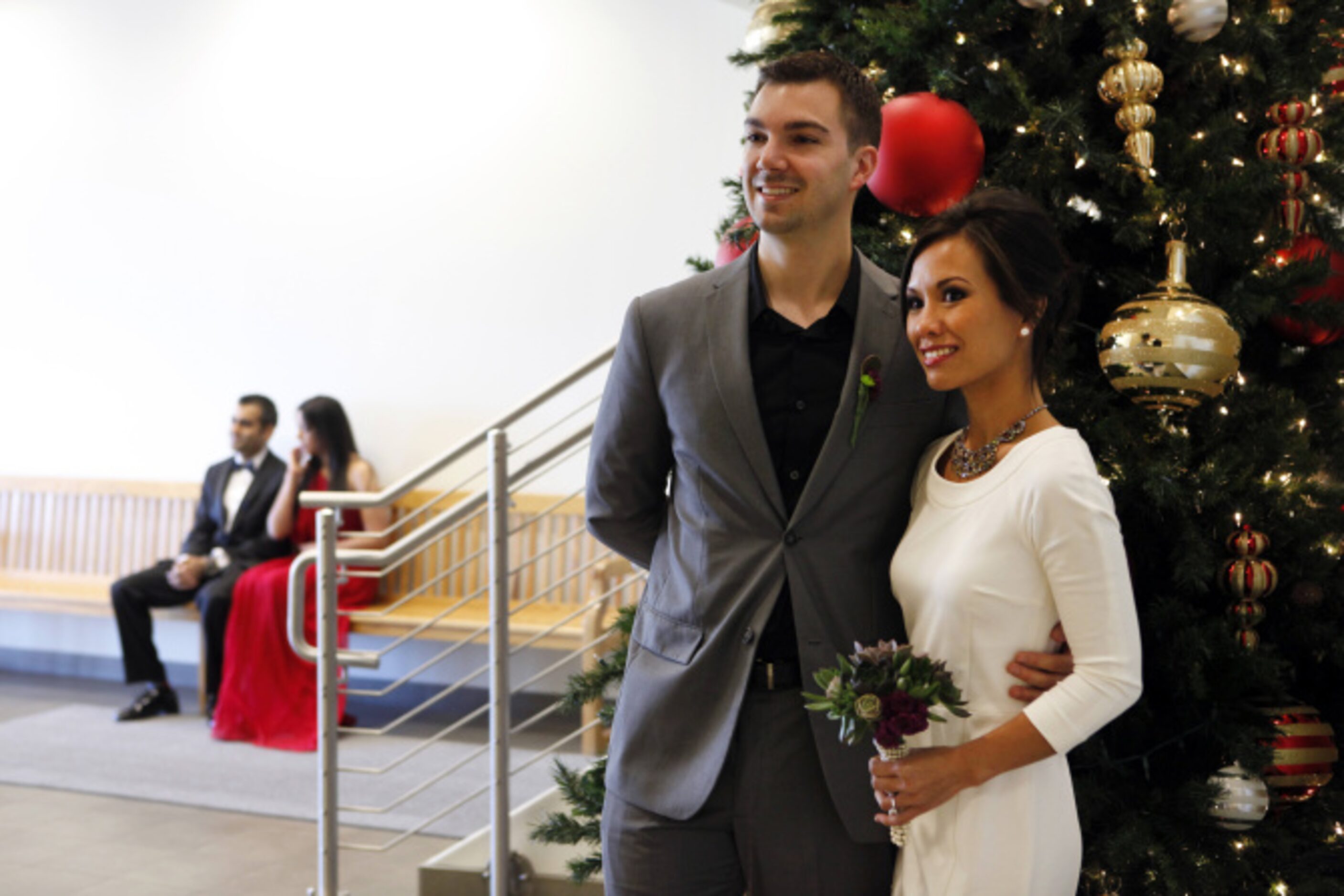 Troy and Alyssa Lannoo pose for pictures while waiting to get married on 12-12-12 by Justice...