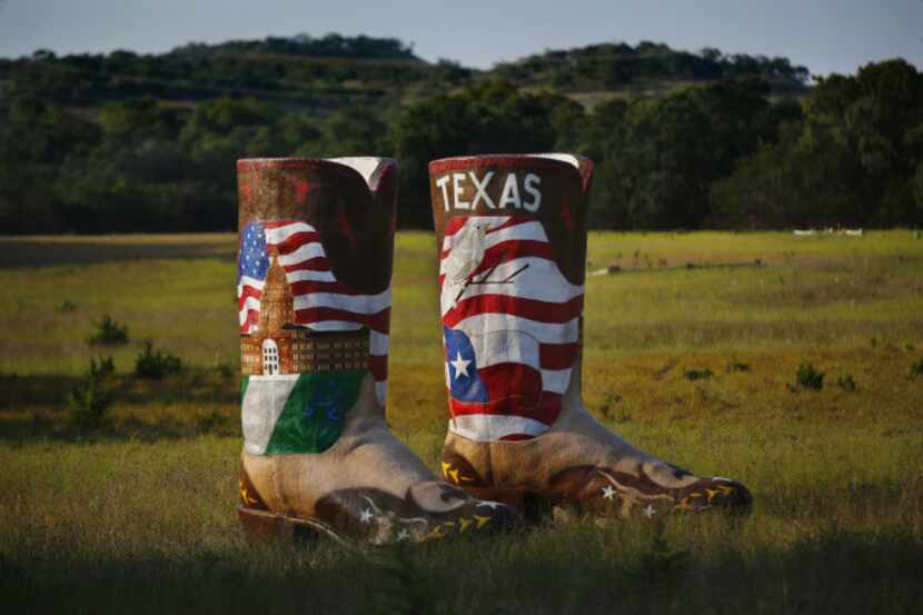 Big Tex's boots are photographed on Friday, August 30, 2013, in a meadow outside the SRO...
