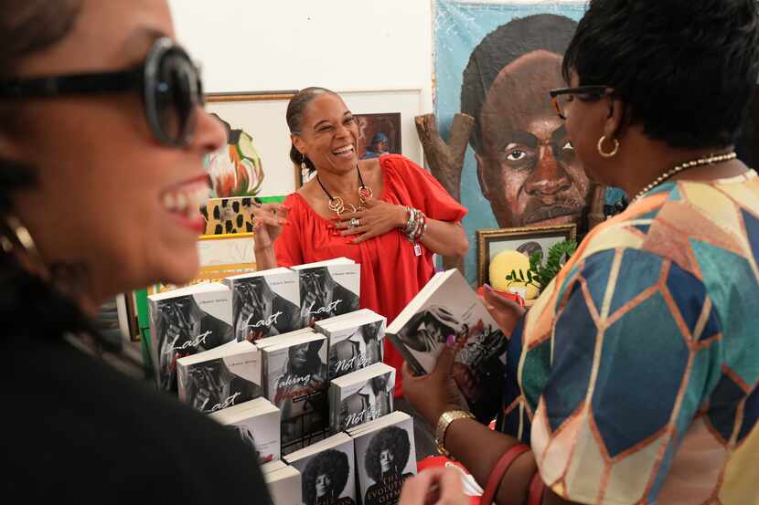 Jamila Pamoja-Thomas spoke with Jeanna Nobles (left) and Sonya Rundles during her book...