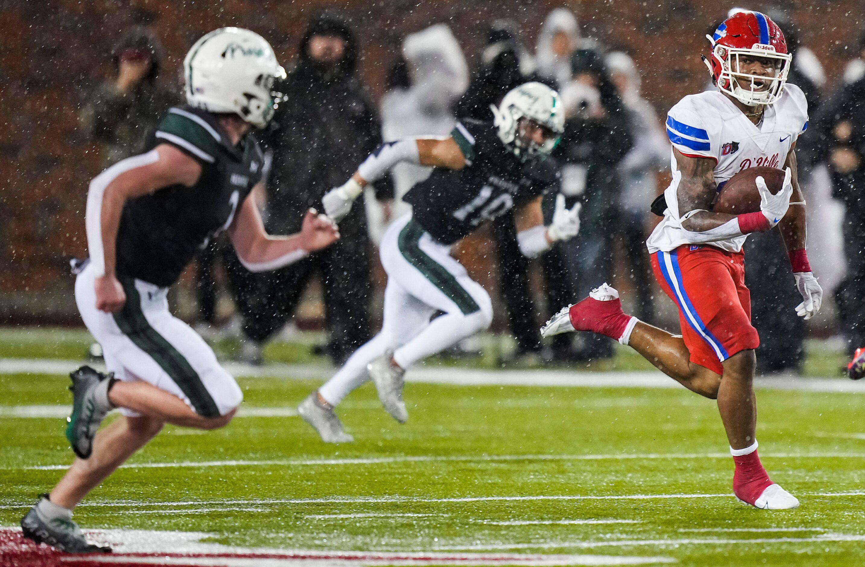 Duncanville running back Caden Durham (29) gets past Prosper defensive back Carson McClendon...