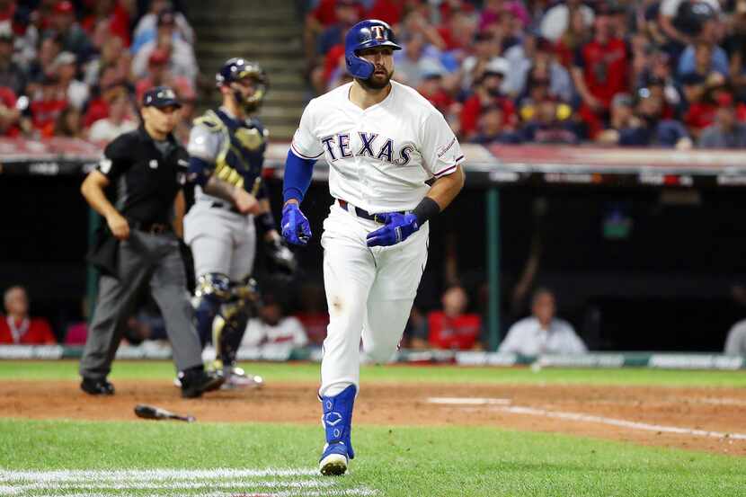 Joey Gallo of the Texas Rangers runs the bases after hitting a solo home run during the...