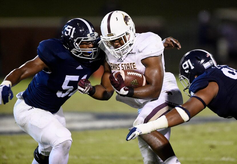 STATESBORO, GA - OCTOBER 29:  Running back Robert Lowe #28 of the Texas State Bobcats is...