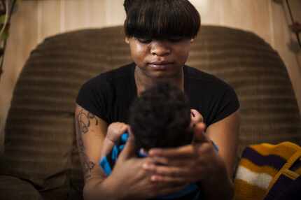 A woman and her week-old son participated in a Nurse-Family Partnership, a program that...
