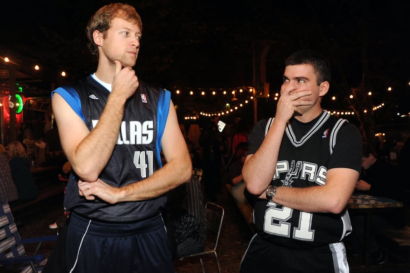 Okay, these guys are just fans of the Mavericks and Spurs. But they seem to be sizing each...