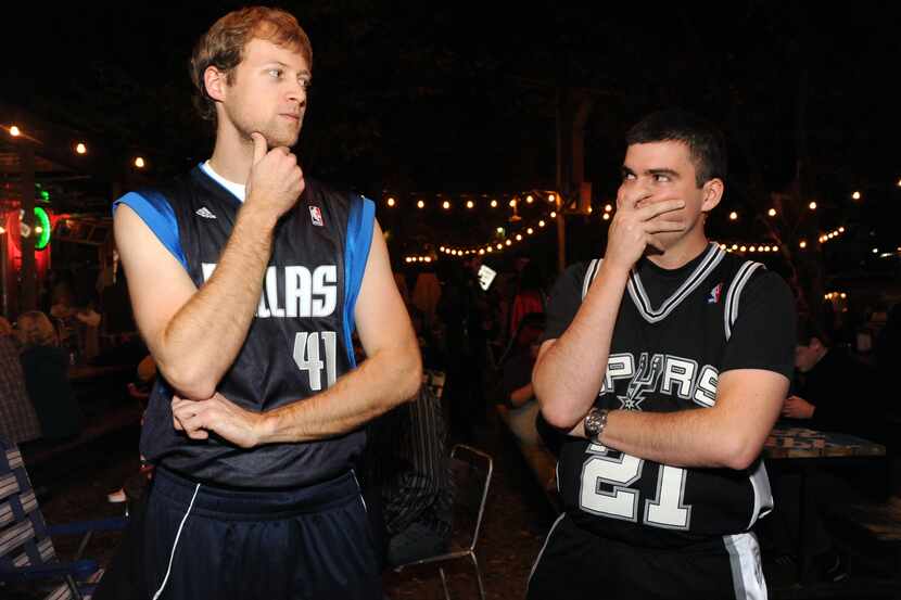 Okay, these guys are just fans of the Mavericks and Spurs. But they seem to be sizing each...