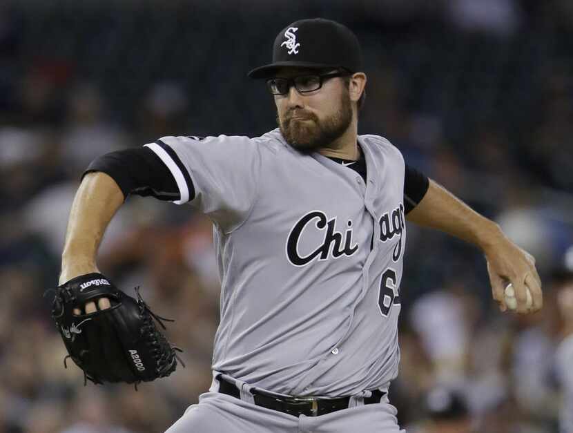 Chicago White Sox's Matt Purke pitches against the Detroit Tigers during the eighth inning...
