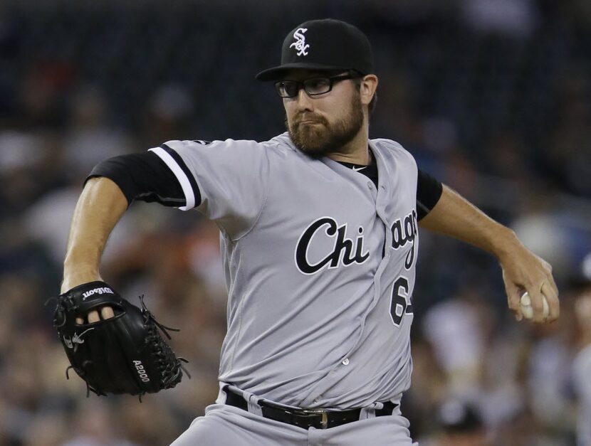 Chicago White Sox's Matt Purke pitches against the Detroit Tigers during the eighth inning...