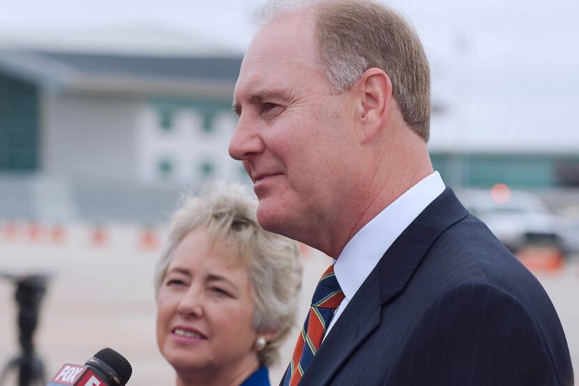  Southwest Airlines chairman and CEO Gary Kelly and Houston Mayor Annise Parker talk to...