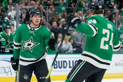 Dallas Stars defenseman Miro Heiskanen (4) celebrates his goal with center Roope Hintz (24)...