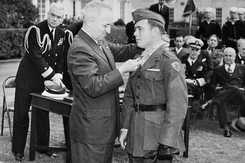 President Harry Truman bestows the Medal of Honor on Cpl. Hershel "Woody" Williams.