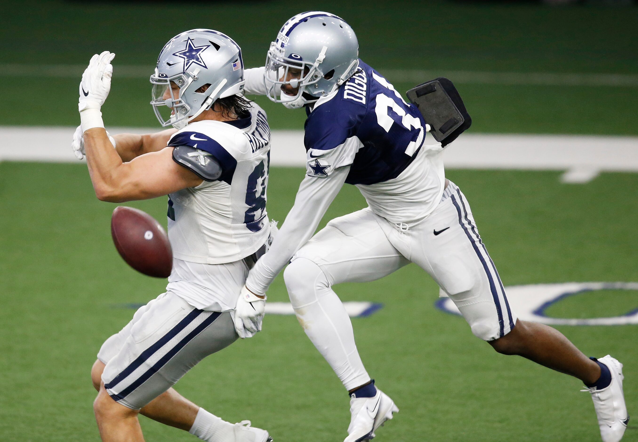 Dallas Cowboys cornerback Trevon Diggs (31) breaks up a pass intended for Dallas Cowboys...