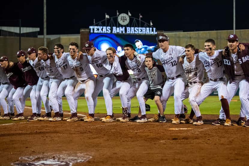 The Texas A&M baseball team sings the Aggie War Hymn after the walk-off win in game one of...