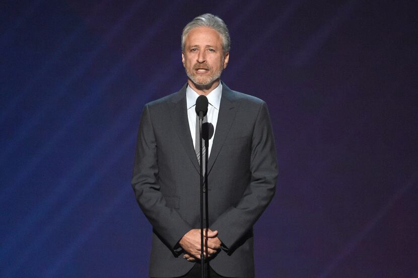 FILE- In this July 12, 2017, file photo, Jon Stewart presents the Pat Tillman award for...