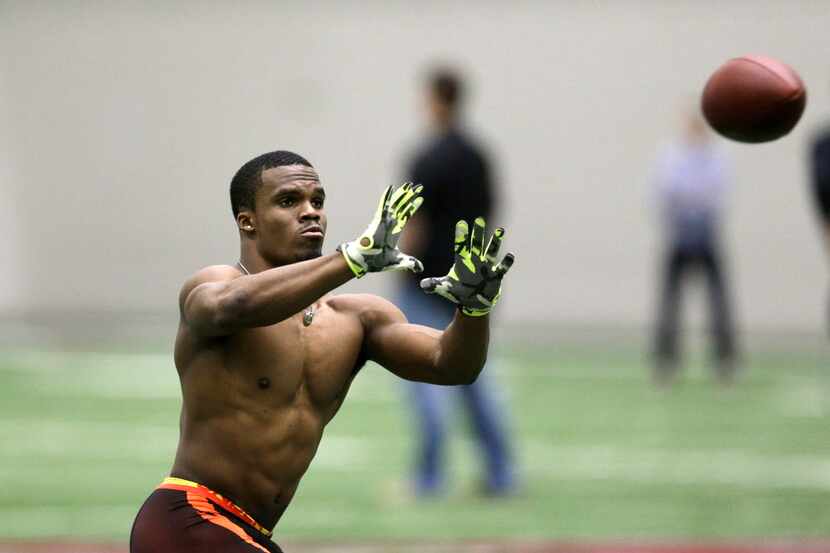 Former Texas A&M running back Trey Williams runs a drill during Texas A&M Pro Day at the...